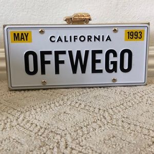 Kate Spade Off We Go License Plate clutch